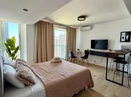 MarDelSuites - Studios Modernos Piso Alto - Vista al Mar, Pileta, Cochera, AC, 2min Playa