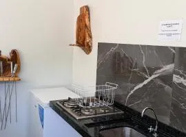 Large barbecue area with a swimming pool and a spacious room