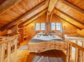 Naturstammhaus Almhütte