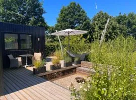 Cosy guesthouse in peaceful garden surroundings