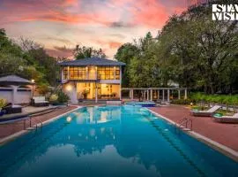 StayVista at Ananta - Breakfast Included & Basketball Court