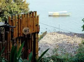 Nomia Garden Retreats - Khu nghỉ dưỡng hồ Trị An