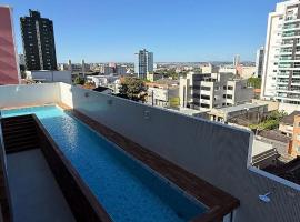 Apto Central C/ Suite Ar Cond 2 Vagas Garagem, Hotel in Ponta Grossa