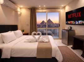SuN roof pyramids view inn Jacuzzi stay & tours, Hotel in Kairo