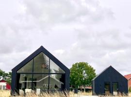 Nyt og hyggeligt sommerhus ved Remmerstrand, khách sạn ở Lemvig