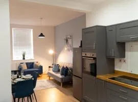 Stylish 3-Bed Home, Co-op Live & Etihad Garden, Free Parking and modern WORKPLACE