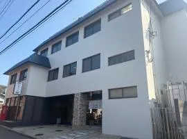 Guesthouse NanairoDougoなないろゲストハウス