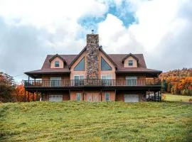 Expansive Getaway Designed for Gatherings with Game Room & Scenic Decks in Stamford, New York