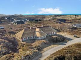 Thatched house with pool by the sea - SJ690, hotel a Harboør