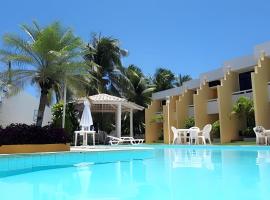 Guarajuba, duplex 2/4 pé na areia โรงแรมในกวาราจูบา