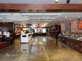 James Joyce Coffetel Golmud Huaxing Plaza Branch, hotel v destinaci Golmud