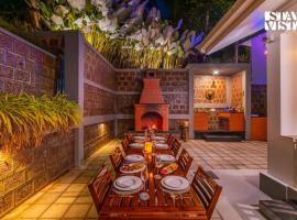 Stayvista at Haven Grandeur - Coorg Virajpet, Hotel in Madikeri