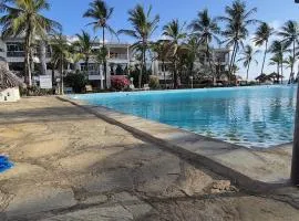 Two bedroom two bed beachfront apartment with large pool