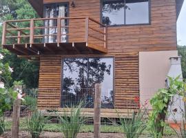 Chalé com jacuzzi, recanto dos Colibris, хотел в Торес