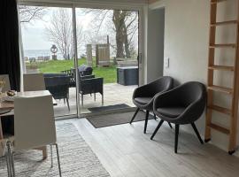 Stay close to the beach overlooking the sea in beautiful Svarte, Hotel in Ystad