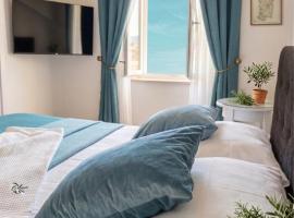 Jacaranda Rooms, hotelli kohteessa SantʼAntìoco