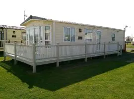 The Grange Ingoldmells Derwent 6 Berth Central heated Wrap Around Decking