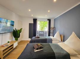 Modern Homes - Voll ausgestatte Wohnung - Balkon - Hotelbetten - 4K TV - WLAN, Hotel in Moers