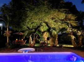 Maison Tropicale avec Piscine et Jardin