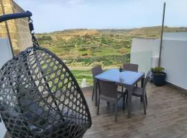 Ta' Frangisku - modern apartment overlooking valley with distant seaview