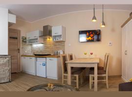 Cozy Apartment With Garden、グダニスクのホテル