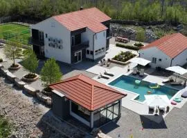 Vila Agape with a pool, football and tennis court