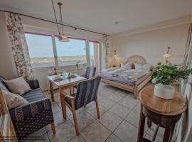 FeWo Sonnenschein mit Pool & Balkon, Hotel in Horumersiel