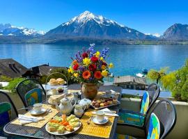 Lake Thun Alps Scenic Views and Concierge by SwissHut, Hotel in Sigriswil