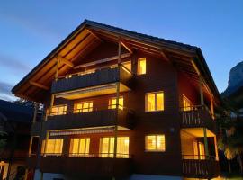 Lake Thun Alps Scenic Views and Concierge by SwissHut, Hotel in Sigriswil