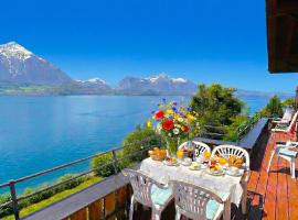 Lake Thun Alps Scenic Views and Concierge by SwissHut, hotel Merligenben
