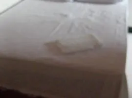 Quarto aconchegante com banheiro externo