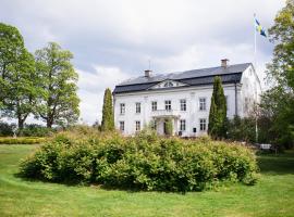 Wallby Säteri, hotel i Skirö