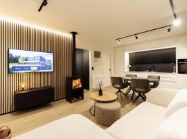 Nature Lake Village – Villa n°18 – 4 personnes avec jacuzzi, hotel di Bullange