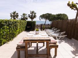 Baconer - Casa en l'Ampolla con jard&iacute;n privado y acceso directo al mar - Deltavacaciones, hotel en L'Ampolla
