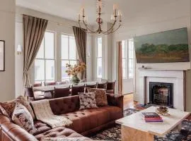 Lush Garden District Suite & Shared Outdoor Space