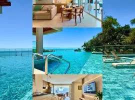 Apartamento em Condomínio Frente-Mar com Piscinas, Jacuzzi Aquecida, Sauna, Academia, Brinquedoteca, Churrasqueira na Sacada, Cozinha Completa e Lazer de Home Club