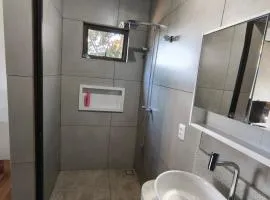Quatro com suite e cozinha