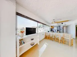 Central Puerto Vallarta condo with pool, ocean views & fast WiFI - walk to beach