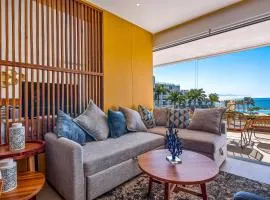 Oceanfront condo with a full kitchen, pool, & beach access