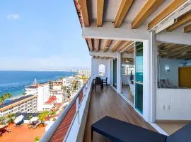 Stylish coastal condo with pool, private balcony & stunning ocean views
