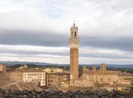 Il NIDO-Attico Siena Centro con vista Duomo e Torre Del Mangia