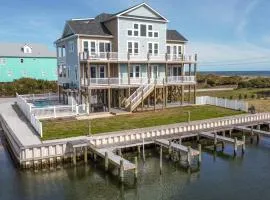 Experience waterfront luxury at Nautical Pointe, a 7-bedroom ocean view home in North Topsail Beach