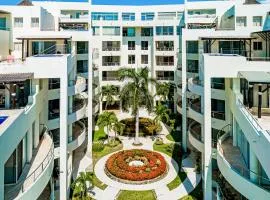 Ground-floor condo with resort pool, balcony, & pool tables