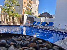 B3 Condo con terraza privada y jacuzzi a metros de la playa, hotel en Rincón de Guayabitos