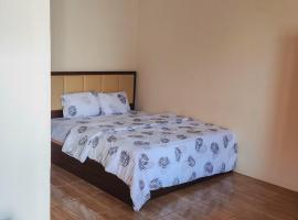 New Era Family Homestay Binjai Mitra RedDoorz, hotel em Binjai
