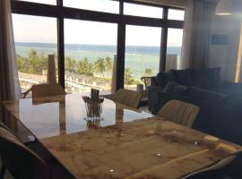Tulivu Stays Sandyshore Apartments, hotel din Kikambala