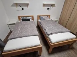 Přízemní moderní byt 2kk s výhledem do zahrady