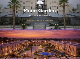 حديقة القمر للشقق الفندقية، فندق في Umm as Sala‘
