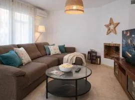 Casa familiar con patio privado y piscina comunitaria cerca de la playa