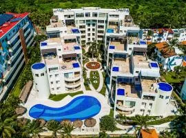 Charming condo with ocean-view, pool & balcony